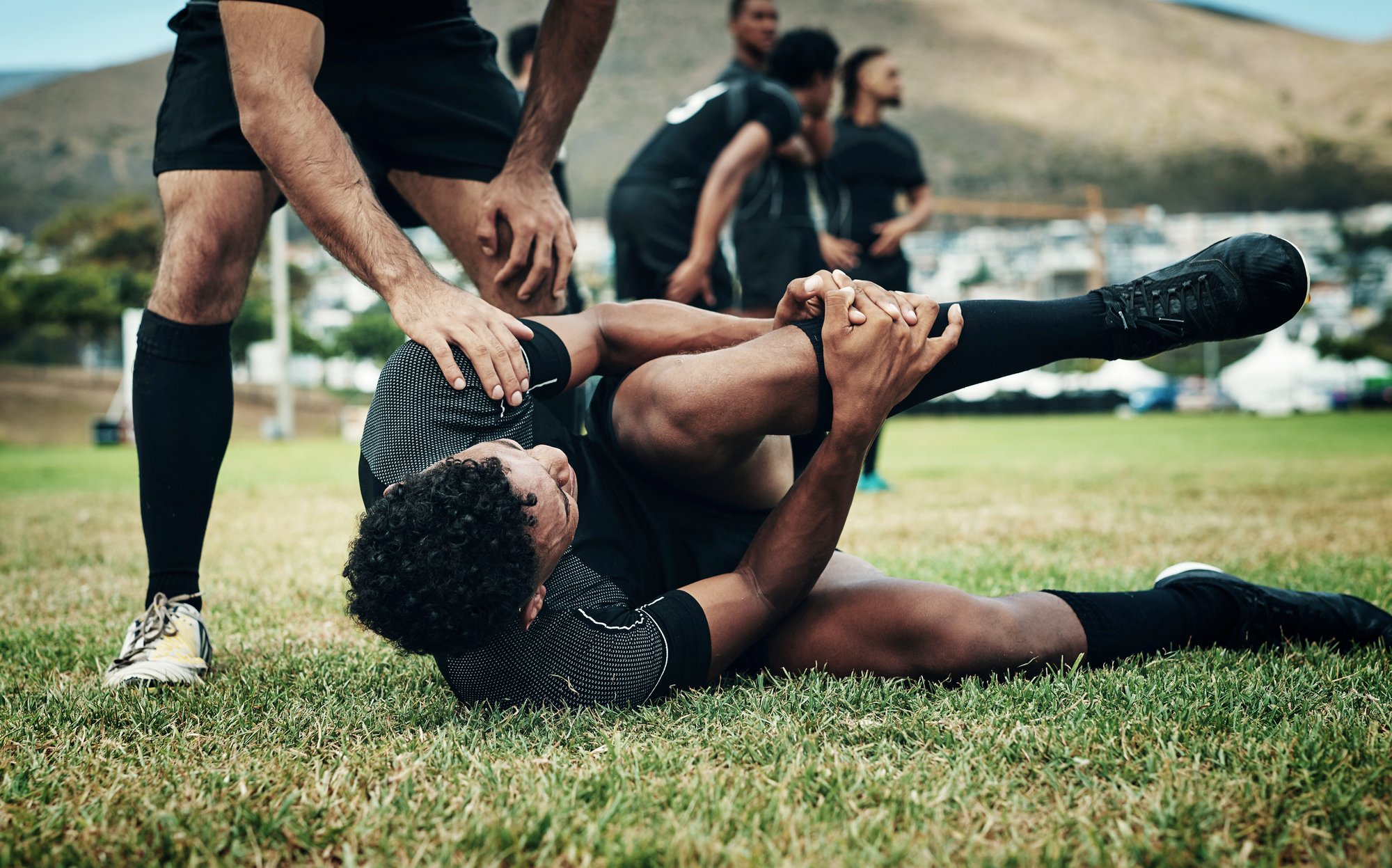 cropped-shot-of-a-handsome-young-rugby-player-suff-2023-11-27-05-35-52-utc