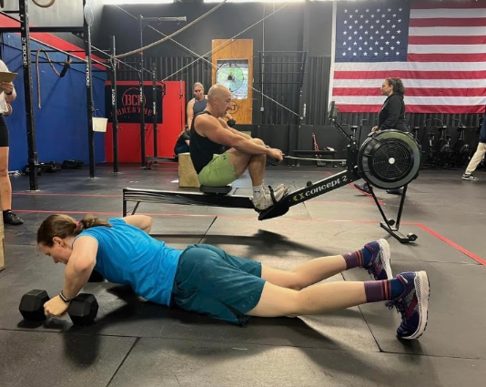 Patient working with a provider at a performance physical therapy clinic in Dallas, TX during a return-to-sport testing session